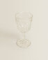 Raised design wine glass