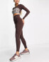 Daisy Street Active Distorted Geo cropped long sleeve top with cutout in brown checkerboard