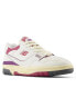 New Balance 550 trainers in white with pink detail