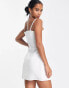 In The Style Petite x Yasmin Devonport exclusive 90's bandeau button detail mini dress in white