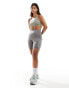 Nike Training Swoosh light support sports bra in khaki