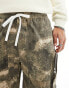 The Couture Club camo print cargo shorts in multi