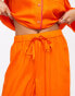 ASOS DESIGN Petite exclusive modal shirt & trouser pyjama set with contrast piping in orange