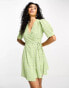 Glamorous short sleeve wrap mini tea dress in green ditsy