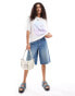 Monki short sleeve relaxed fit t-shirt with dolphin print in white