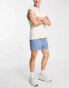 ASOS DESIGN skinny regular length denim shorts with elasticated waist in mid wash