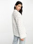 ASOS DESIGN relaxed broderie shirt with dipped hem in white