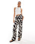 Vero Moda Tall linen touch wide leg trousers in abstract mono print