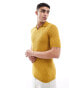 ASOS DESIGN knitted short sleeve polo with diamond texture in mustard