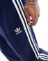 adidas Originals Beckenbauer tracksuit bottoms in indigo