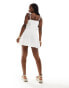 In The Style cami drop waist dress with pleated hem in white