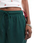 New Balance Athletics mesh shorts in green