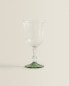 Raised design wine glass