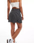 Miss Selfridge button through flippy mini skirt in black polka dot