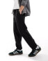 River Island pin tuck joggers in black