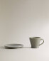 Glazed stoneware espresso cup and saucer