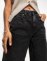 ASOS DESIGN Petite wide leg dad jeans in washed black