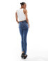 ASOS DESIGN Tall ultimate skinny jeans in mid blue