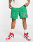 The Couture Club co-ord mesh varsity shorts in green with racer print