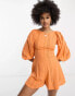 ASOS DESIGN Tall ladder detail mini beach playsuit with lace up back in orange