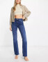 River Island mid rise flare jean in dark blue