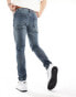 ASOS DESIGN skinny jeans with abrasions in dark wash blue