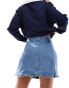 Wrangler denim mini skirt in mid wash