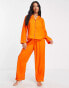 ASOS DESIGN Petite exclusive modal shirt & trouser pyjama set with contrast piping in orange