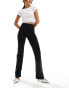 The Couture Club emblem soft touch yoga pants in black