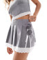 Reclaimed Vintage mini tailored skirt with lace trim and flower corsage in grey