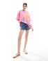 ASOS DESIGN oversized t-shirt with dolce vita art graphic in bright pink