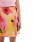 Monki mini wrap skirt with tie up side in multi hibiscus print