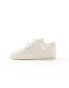 adidas Originals Rivalry low trainers in white and pale pink