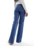 & Other Stories high waist flared jeans in mid blue