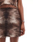 Reclaimed Vintage mini skirt with bow detail in animal print co-ord