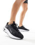 Nike Training Motiva trainers in black and white