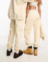 Calvin Klein Jeans unisex cargo joggers in beige - exclusive to ASOS