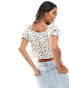 New Look sweetheart neck crop top in white ditsy print