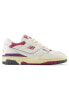 New Balance 550 trainers in white with pink detail