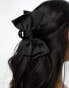 True Decadence bow hair claw in black