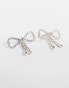 True Decadence embellished bow earrings in silver