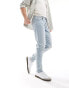 ASOS DESIGN tapered jeans in light wash blue