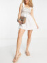 River Island embroidered shirred mini beach dress in white