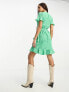 Vero Moda wrap mini dress in bright green spot print