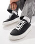 Bershka lace up trainer in black and white