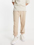 ASOS DESIGN oversized joggers in beige brushed rib texture