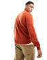 ASOS DESIGN knitted lambswool crew neck jumper in orange