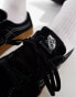 Vans sk8-low trainers in black with gum sole