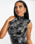 ASOS DESIGN padded shoulder sequin mini dress in newspaper print