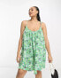 ASOS DESIGN Curve tie strap detail trapeze mini slip dress in green tile print